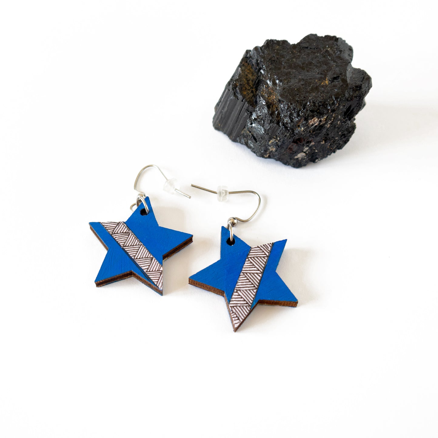 Blue unique wooden earrings in the shape of a star