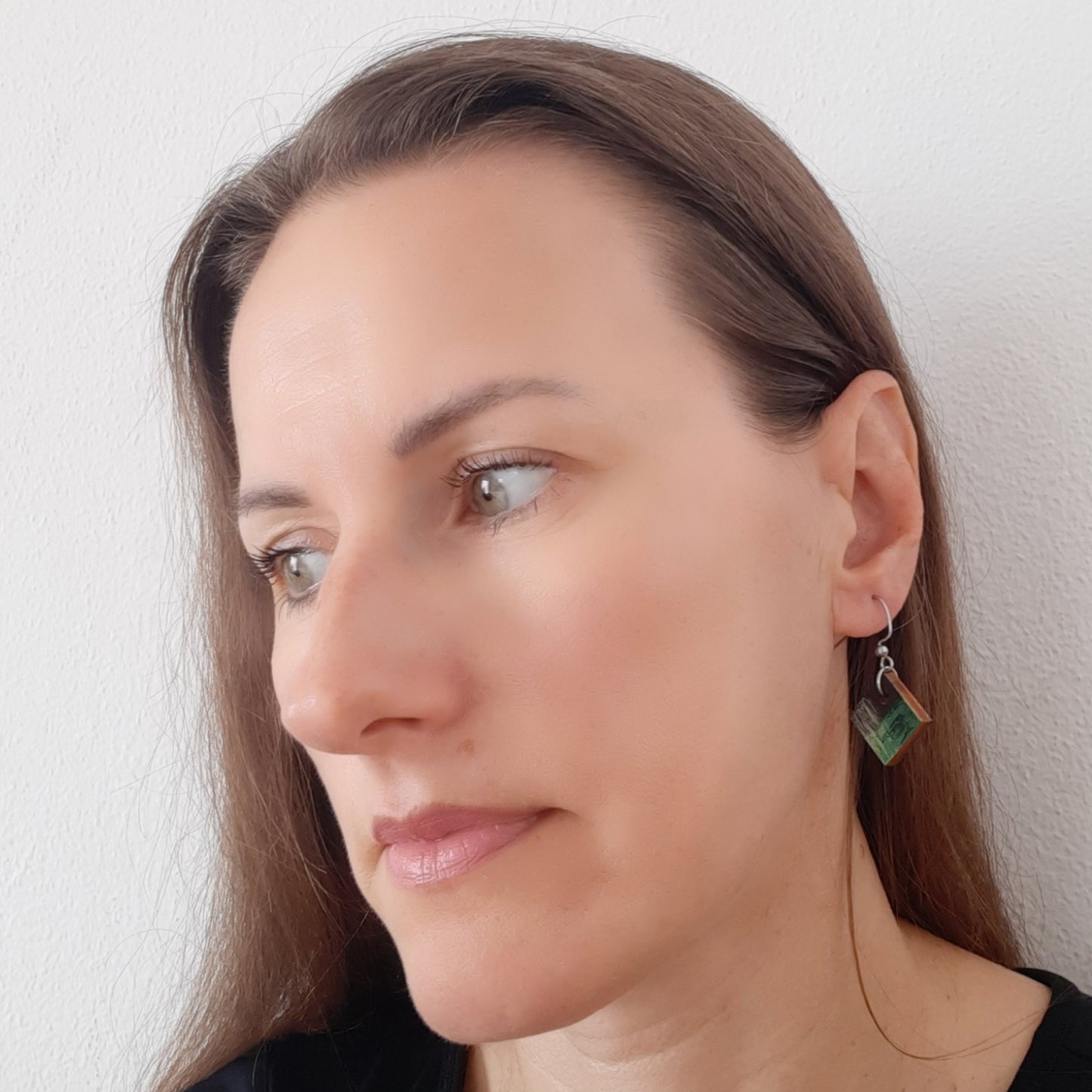 Unique small black earrings with green and yellow details