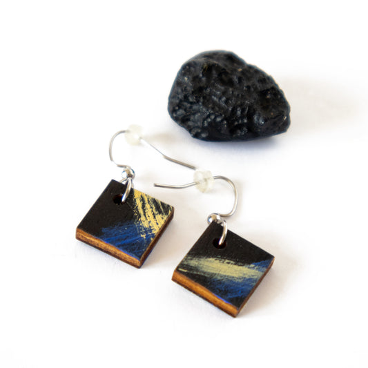 Unique small black earrings with blue-yellow details