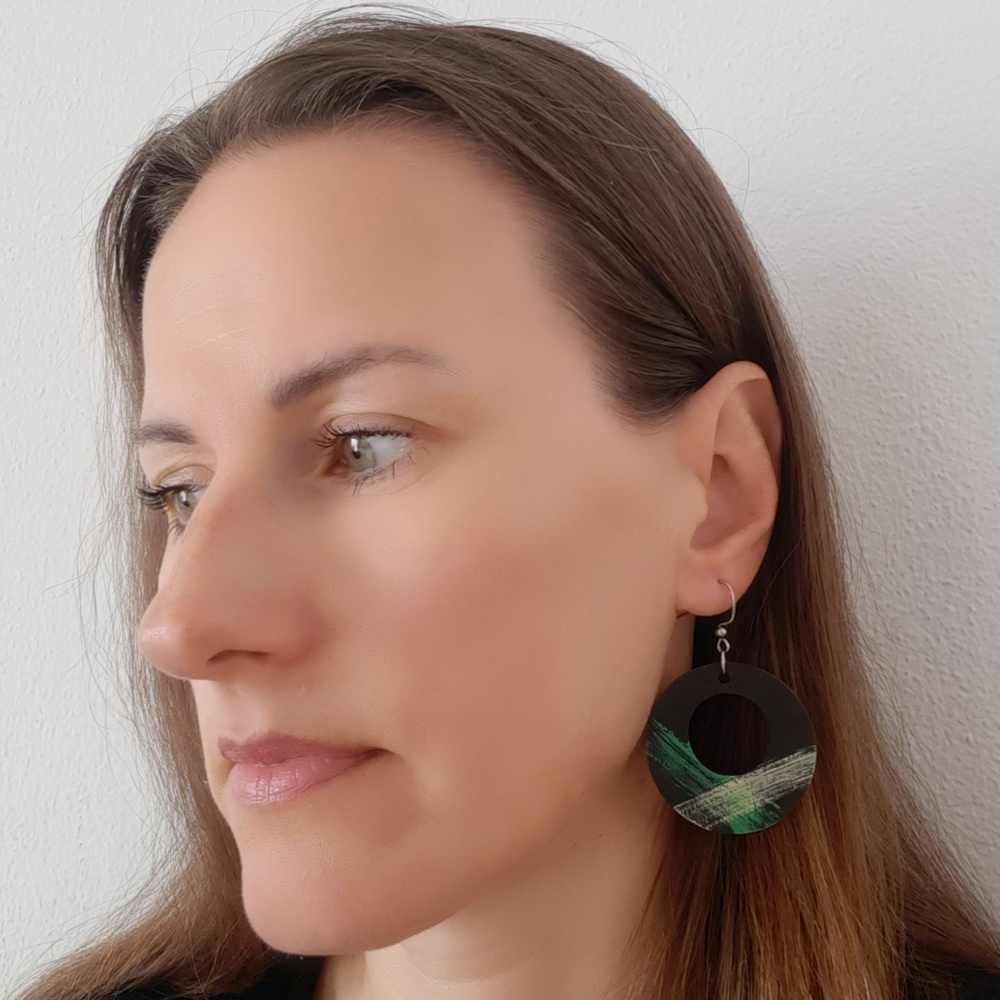 Light black wooden earrings with green and yellow details