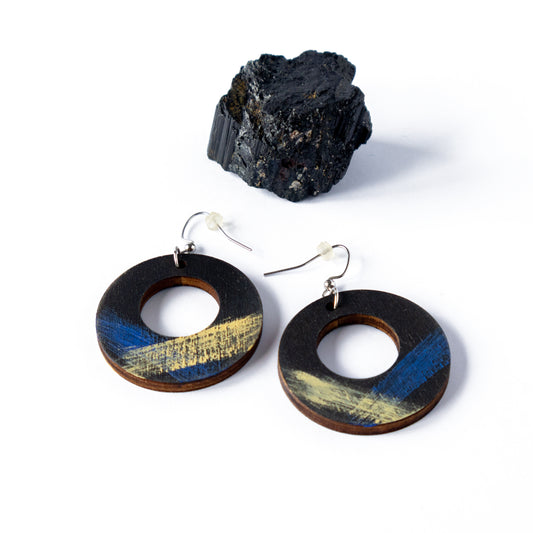 Unique light black wooden earrings with blue and yellow details