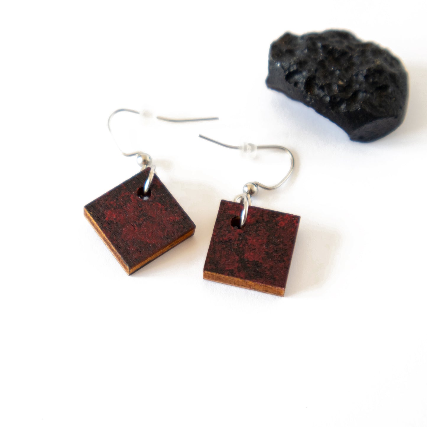 Unique small black earrings with red details