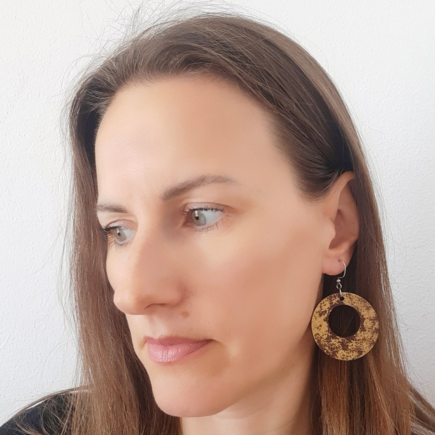 Brown unique wooden earrings with gold details