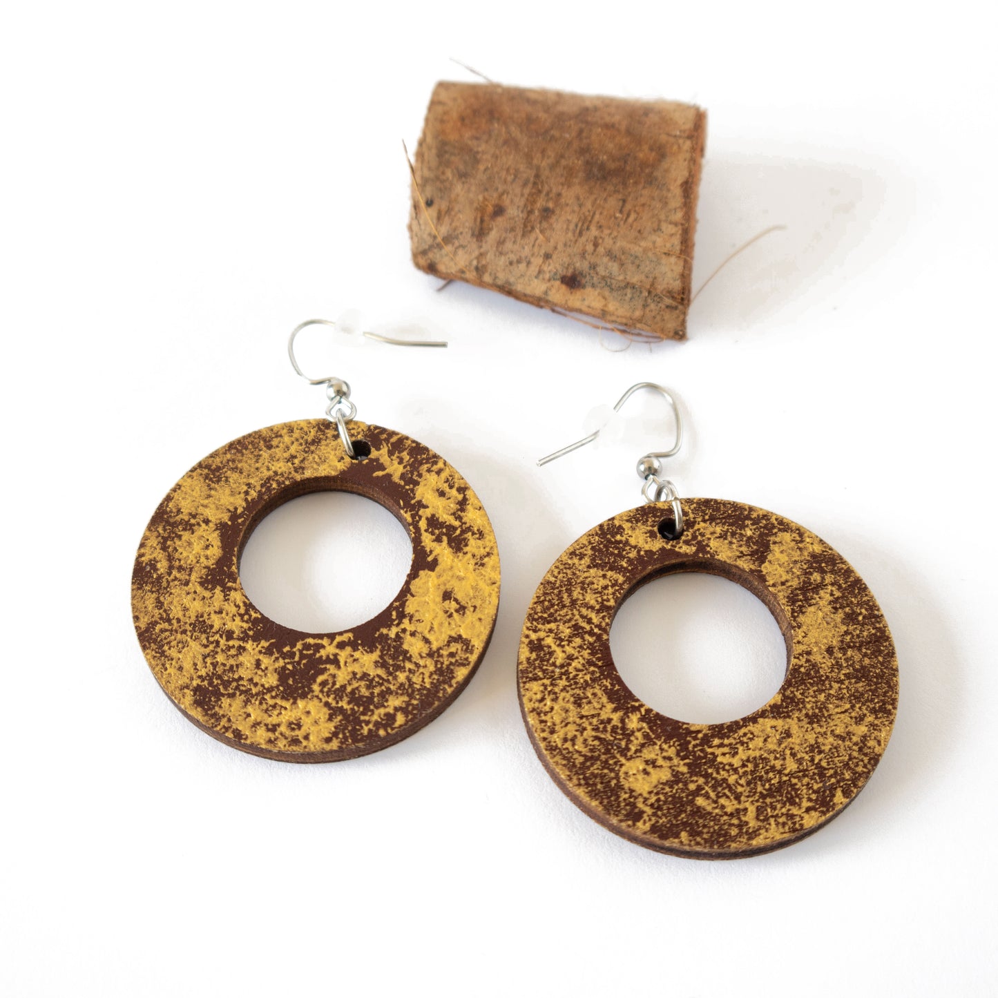 Brown unique wooden earrings with gold details