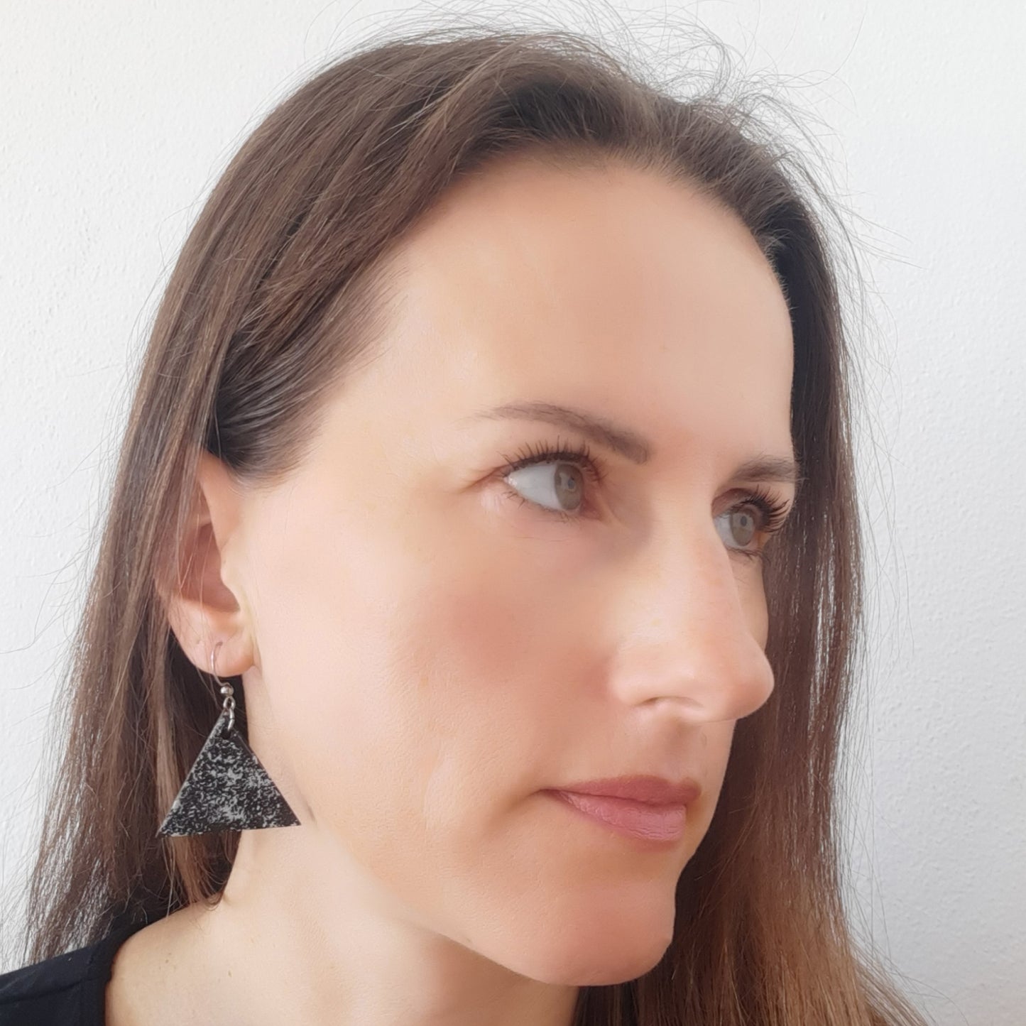 Black wooden earrings with silver details