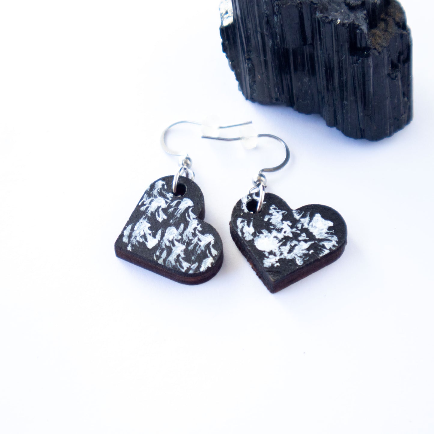 Unique small black wooden earrings with white details