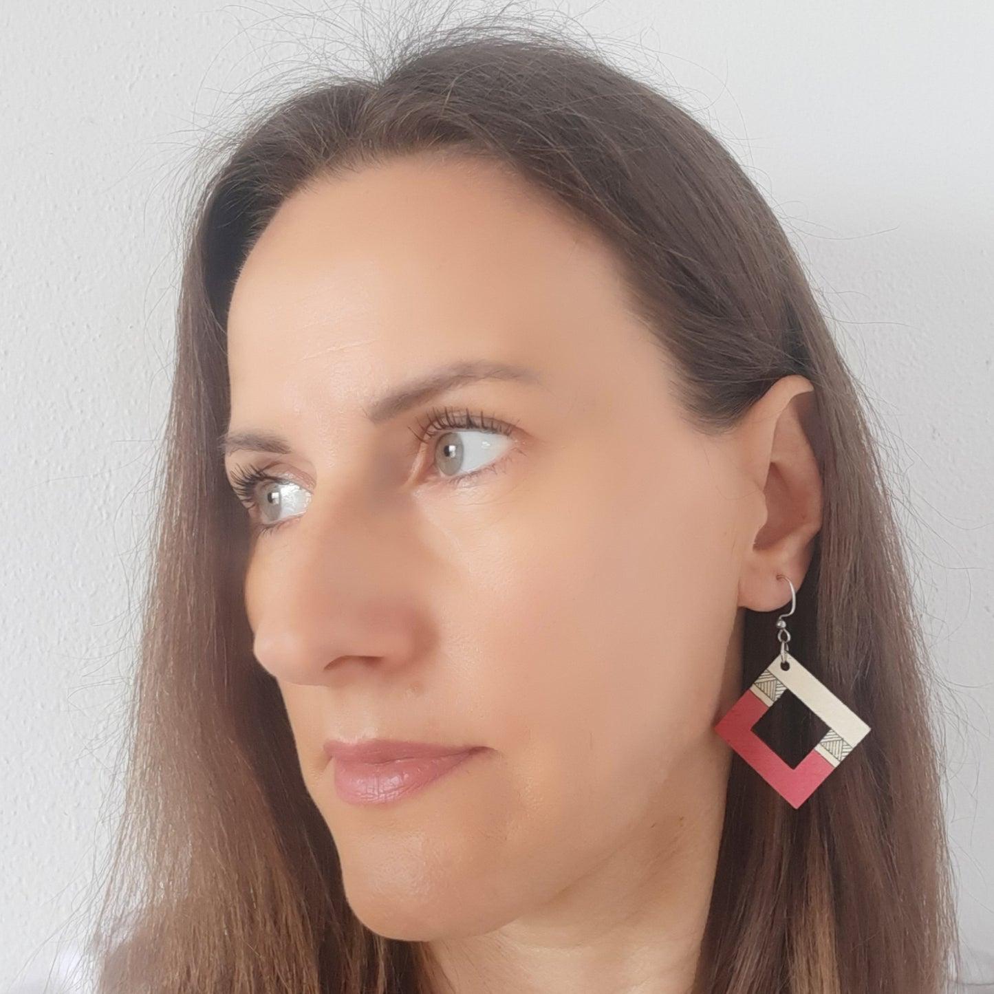 Unique wooden earrings in pink and yellow color