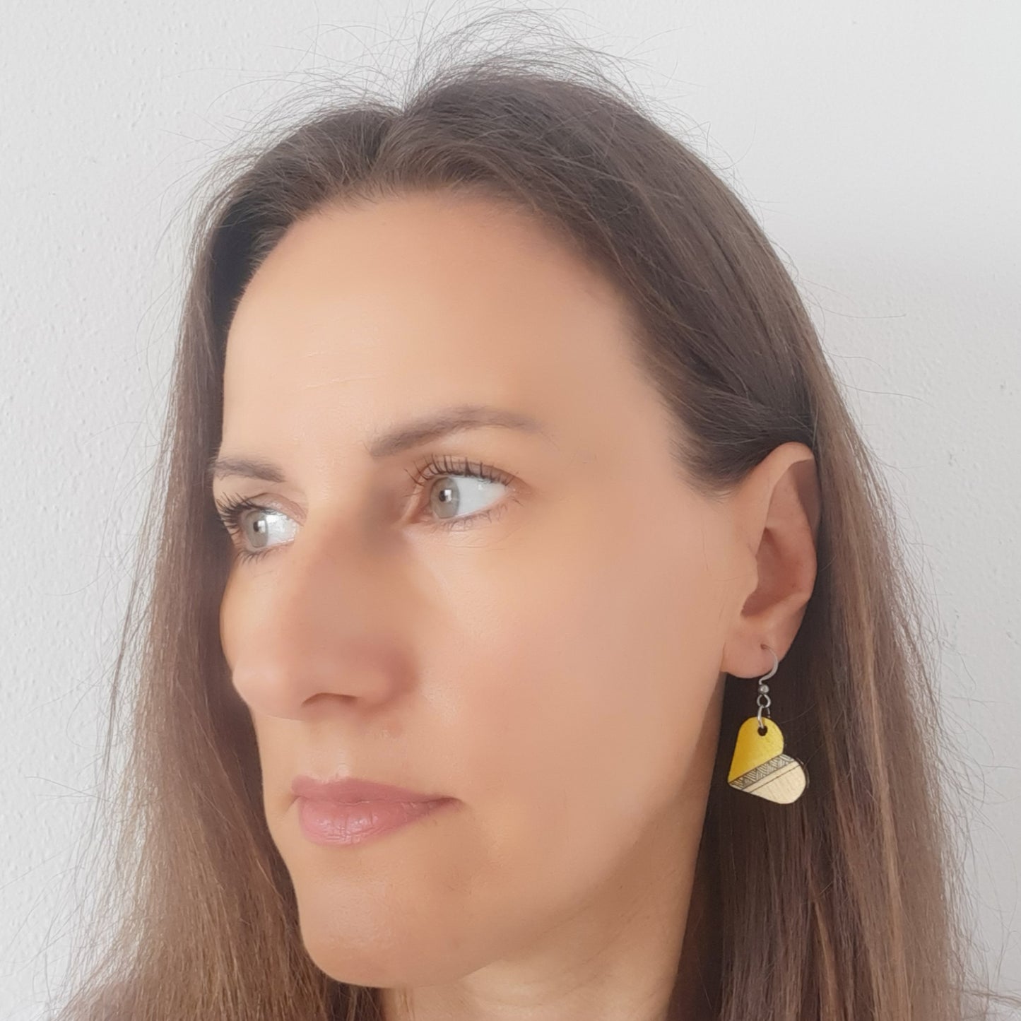 Unique small yellow heart shaped wooden earrings