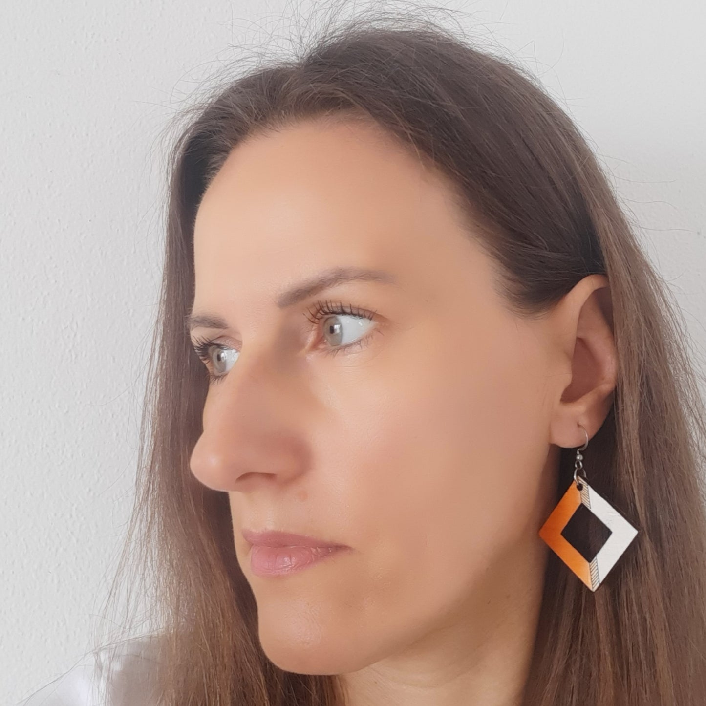 Orange and white unique wooden earrings