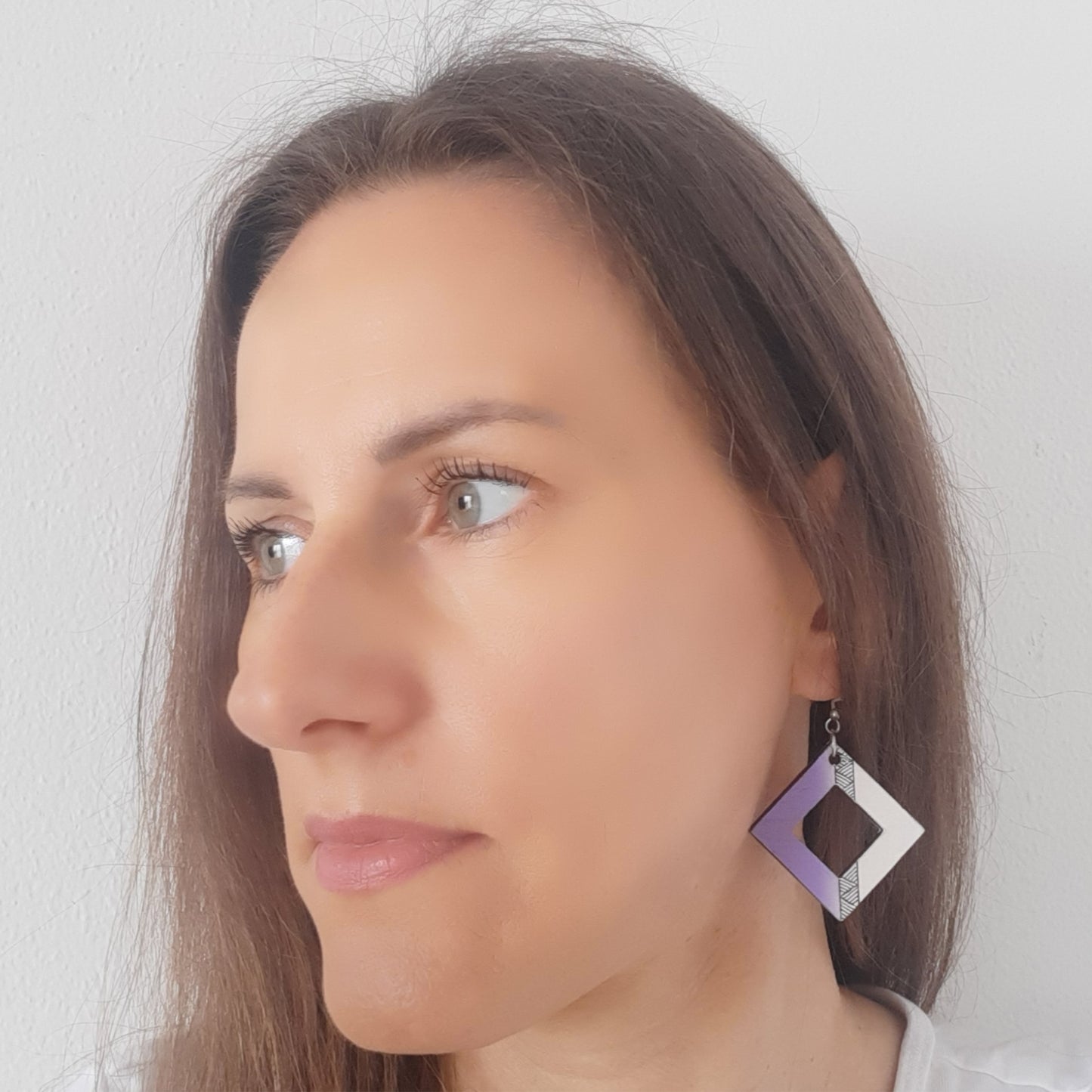 Unique wooden earrings in lavender-white color